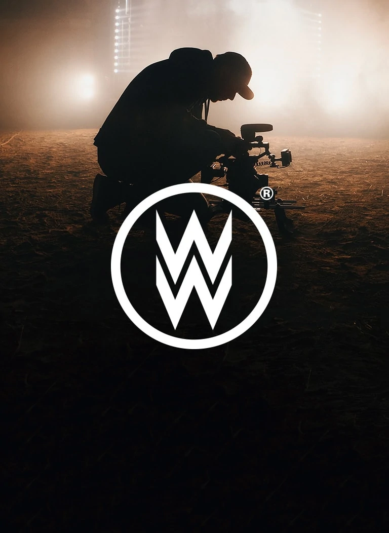 Photo of a camera person overlaid with the Whites logo.